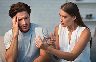 Woman clarifying with mobile phone